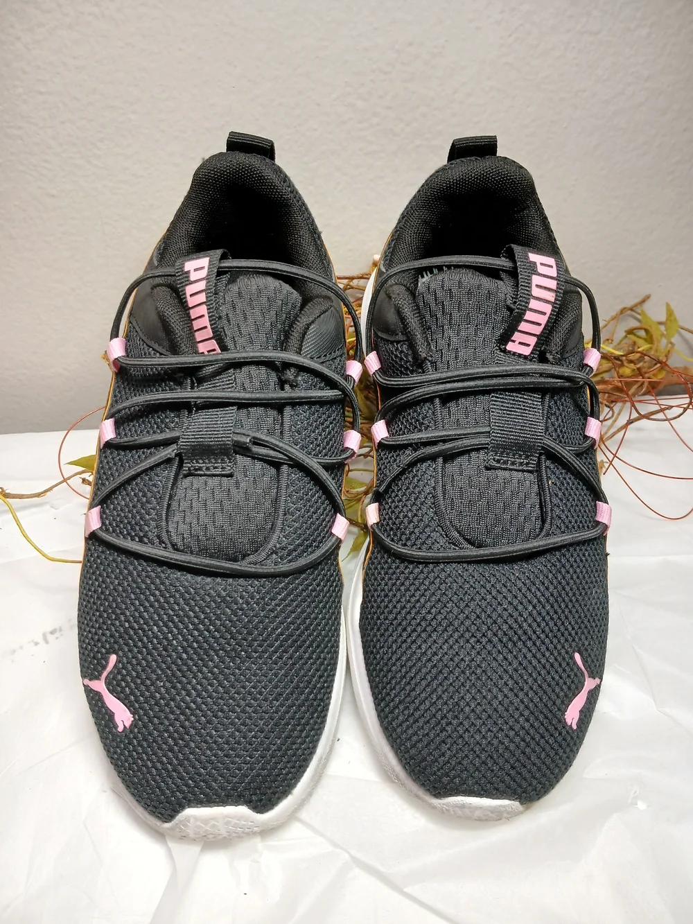 Puma Black Sneakers with Pink Accents and Orange Trim